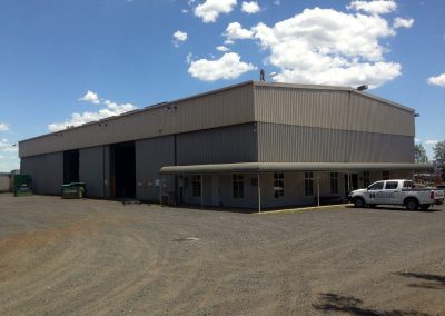 Hort Enterprises Image (Wide shot) Consists Of Work In Progress Exterior Of The Horts Dubbo Workshop Foreground Consists Of Horts Vehicle Parked At Front In Right-Hand Side Of Image